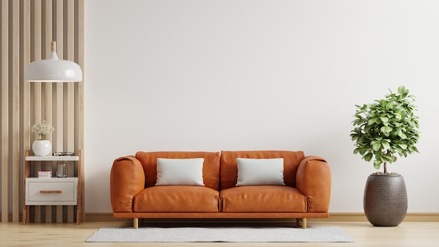 Foto das wohnzimmer mit weißen wänden hat ein orangefarbenes ledersofa und eine minimale dekoration