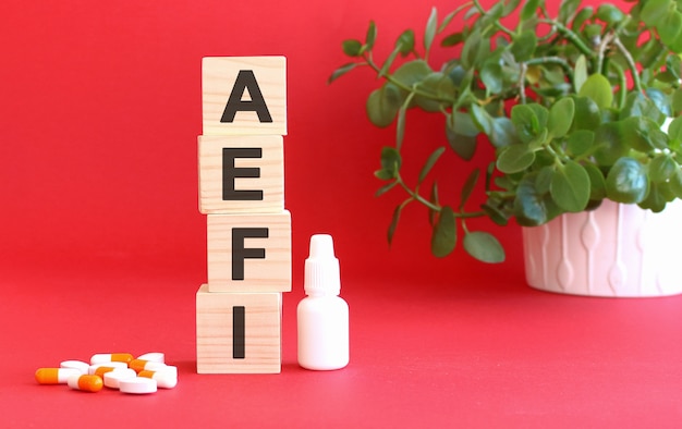 Das Wort AEFI besteht aus Holzwürfeln
