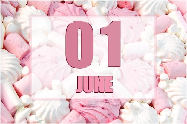 Data do calendário no fundo de marshmallows brancos e rosa 1º de junho é o primeiro dia do mês