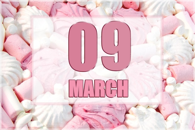 Data do calendário no fundo de marshmallows brancos e rosa 9 de março é o nono dia do mês