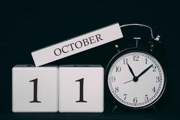 Data e evento importantes em um calendário preto e branco Data do cubo e mês dia 11 de outubro