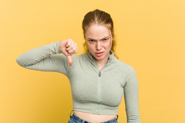 Foto daumen nach unten zeigen und abneigung ausdrücken