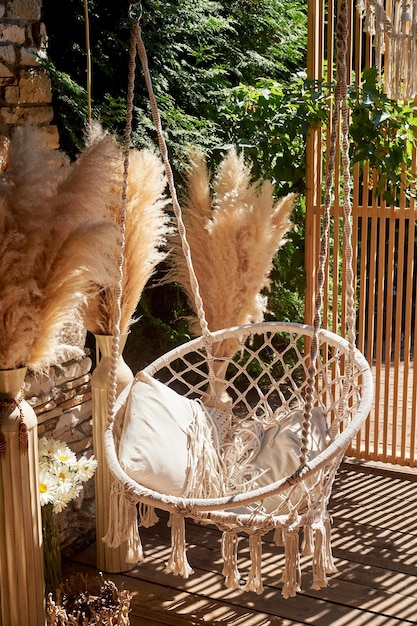 Decoração de casamento Florística balanço ao ar livre com almofadas Um lugar para os convidados relaxarem
