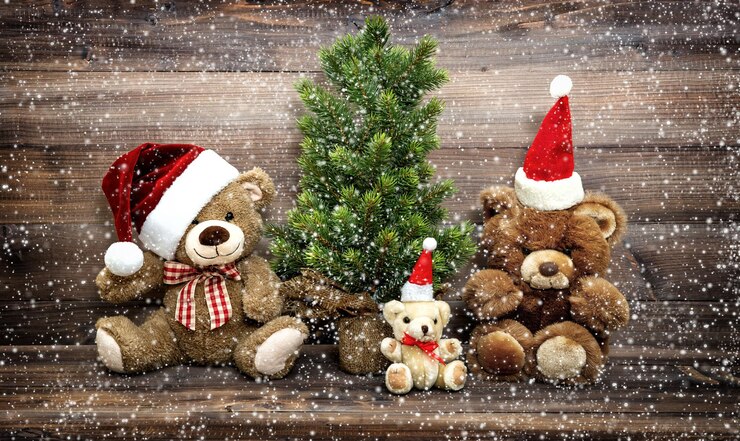 Foto decoração de natal com brinquedos engraçados família teddy bear. imagem em tons de estilo vintage com efeito de neve caindo