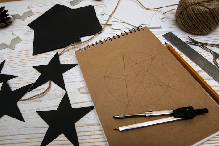 Foto decoraciones de navidad. fabricación de guirnaldas de estrellas. materiales y herramientas