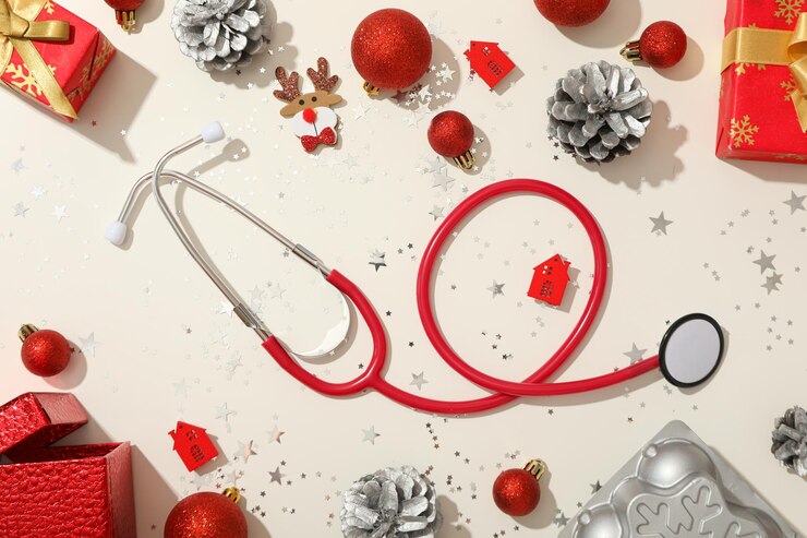 Decoraciones de Navidad y regalos con medicina y estetoscopio