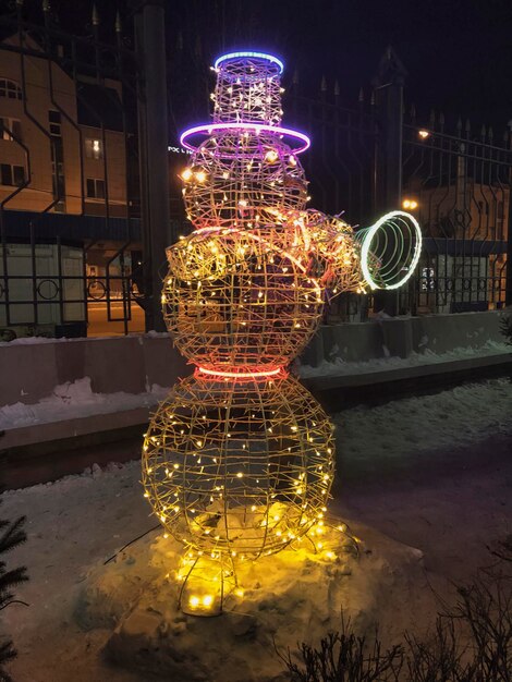 Foto decoraciones navideñas en forma de muñeco de nieve con luces led
