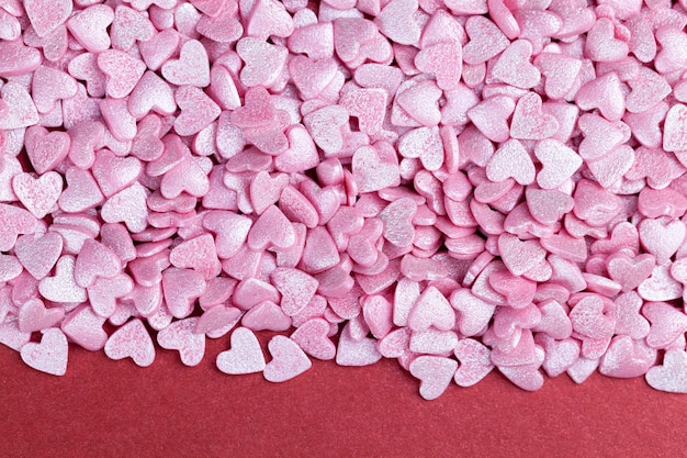 Decoraciones de postre de caramelo dulce rosa en forma de corazón, cerrar