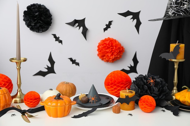 Foto decorações de mesa festivas assustadoras com morcegos e abóboras para o halloween