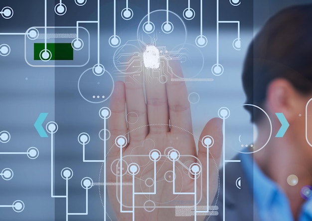 Foto dedo de la empresaria sobre el escáner biométrico y el procesamiento de datos contra un fondo gris. concepto de tecnología y seguridad cibernética