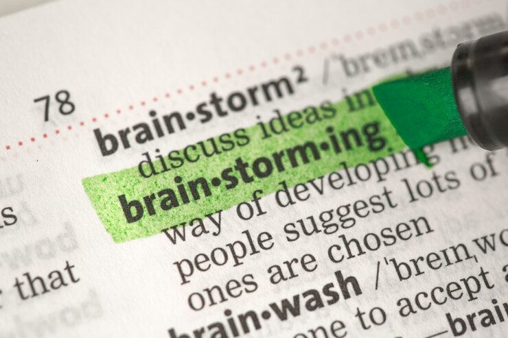 Foto definição de brainstorming destacada em verde