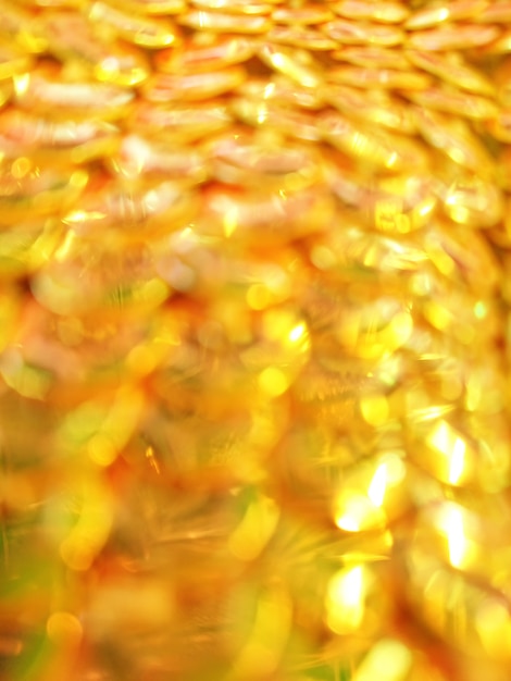 Defocus funkelnde goldene Perle