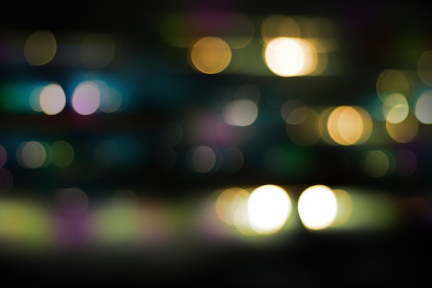 Defocused Stadtnacht gefilterter bokeh Zusammenfassungshintergrund.