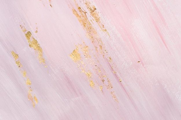 Delicado fondo de mármol rosa con pinceladas doradas lugar para su diseño