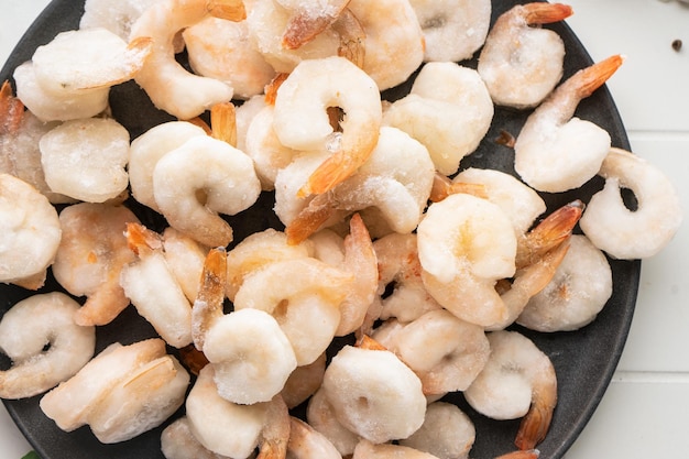 Foto delícia de frutos do mar de camarão descascado descongelado