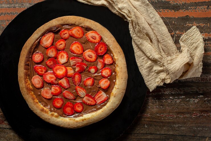 Foto deliciosa pizza de chocolate e morango pizza doce