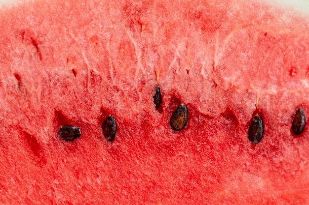 Deliciosa sandía roja jugosa con semillas closeup Fondo de pantalla de verano