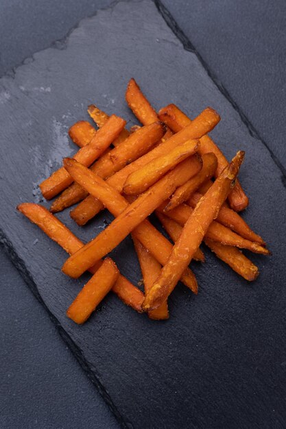 Foto deliciosas batatas fritas de perto