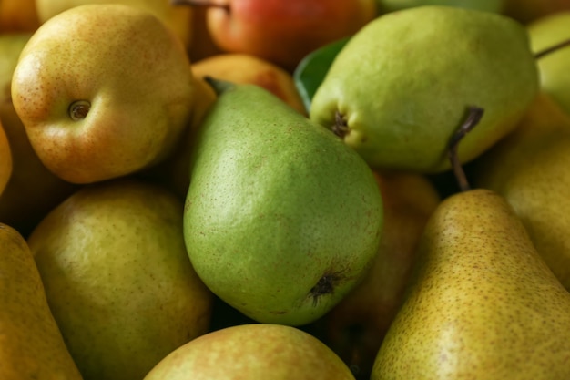 Deliciosas peras maduras como plano de fundo