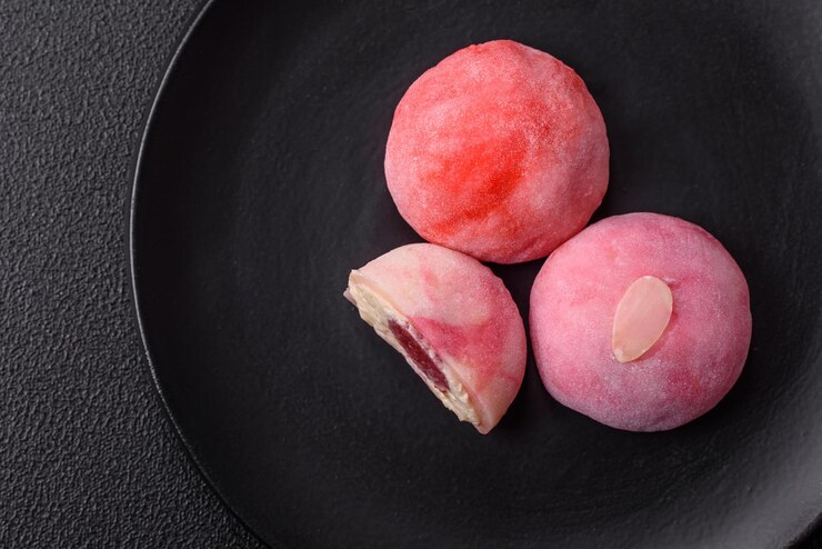 Foto deliciosas sobremesas de mochi doce e refrigerado com recheio de frutas