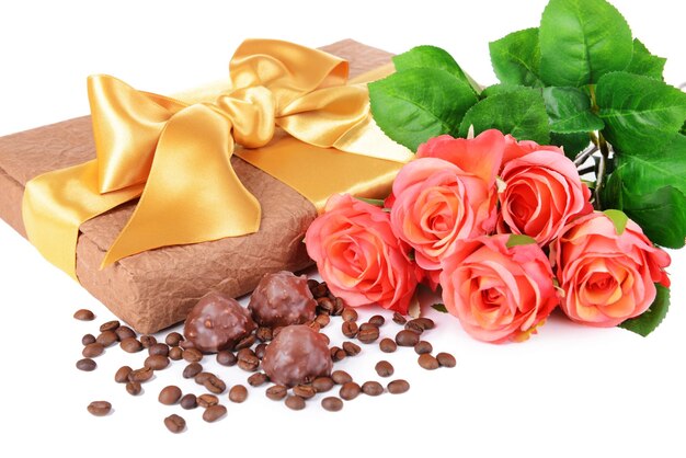 Deliciosos chocolates en caja con primer plano de flores