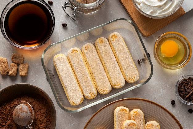 Foto deliciosos ingredientes tiramisu flat lay