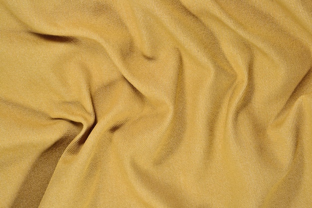 Foto denim amarillo arrugado como textura de fondo