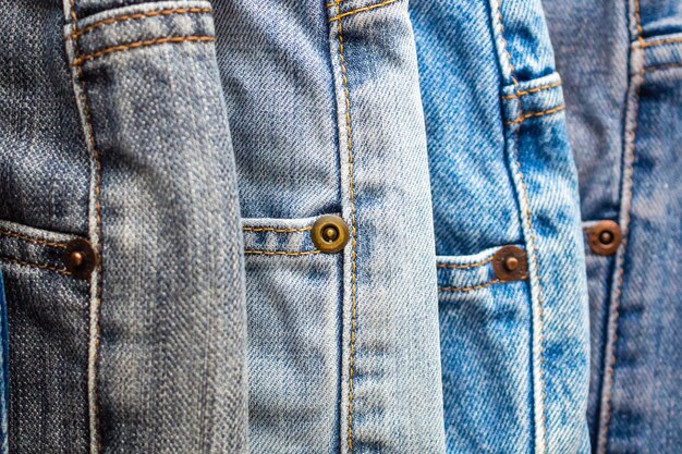 Denim blue jeans empilhar textura de fundo closeup