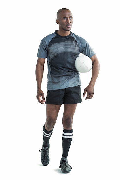 Deportista con pelota de rugby