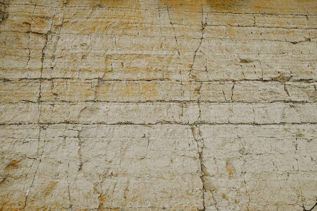 Foto depósitos de piedra caliza natural arenisca fondo de arena