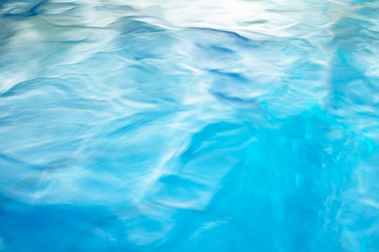 Foto der glatte natürliche hintergrund des blauen wassers