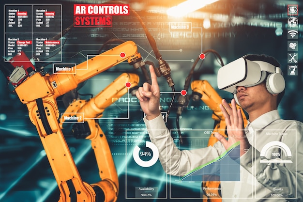 Der Ingenieur steuert Roboterarme mithilfe der Augmented-Reality-Industrietechnologie