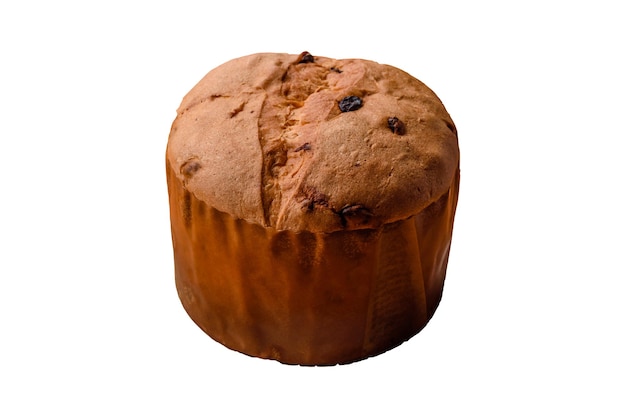 Der köstliche, süße Feiertags-Panetton-Kuchen mit Zest und Rosinen auf einer Keramikplatte