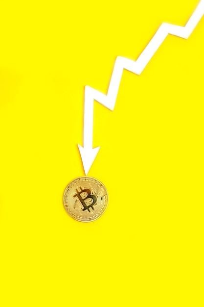 Der Pfeil des Diagramms zeigt den gelben Hintergrund der Bitcoin-Kryptowährung an