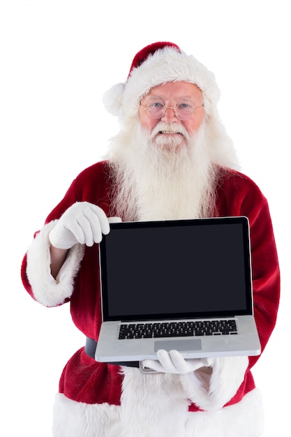 Der Weihnachtsmann präsentiert einen Laptop