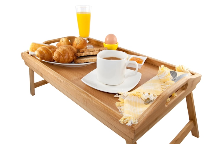 Foto desayuno continental en la cama