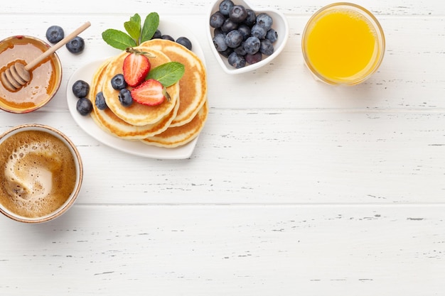 Desayuno con panqueques y café espresso