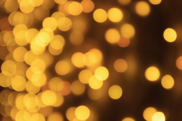 Desenfoque abstracto bokeh luz fondo de vacaciones de Navidad de oro