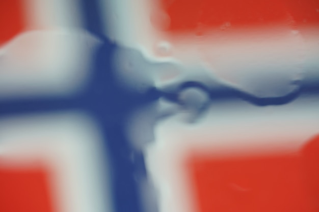 Desenfoque de la gota de agua de la bandera de Noruega para el diseño de fondo