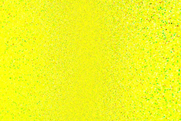 Desenfoque de lente de manchas pequeñas naturales abstractas sobre fondo autogénico amarillo con enfoque selectivo