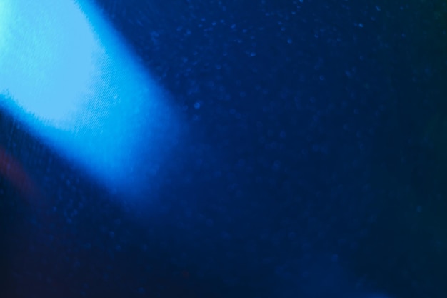 Desenfoque de superposición de luz bokeh brillo azul textura de grano