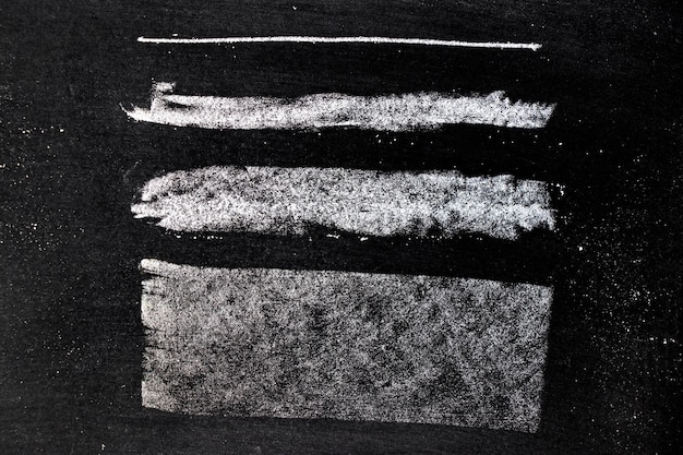 Foto desenho à mão de giz branco em forma de quadrado ou linha no fundo do quadro-negro