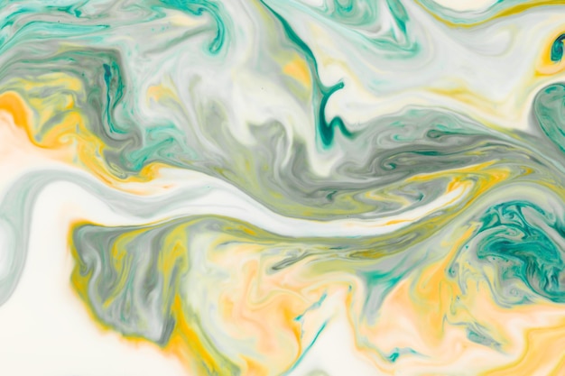 Design abstrato artístico criado com mistura de líquidos coloridos Textura de fundo colorida Líquidos misturando na superfície da água