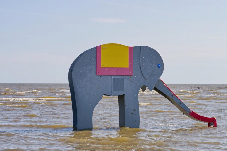 Deslizador infantil Elefant en el mar