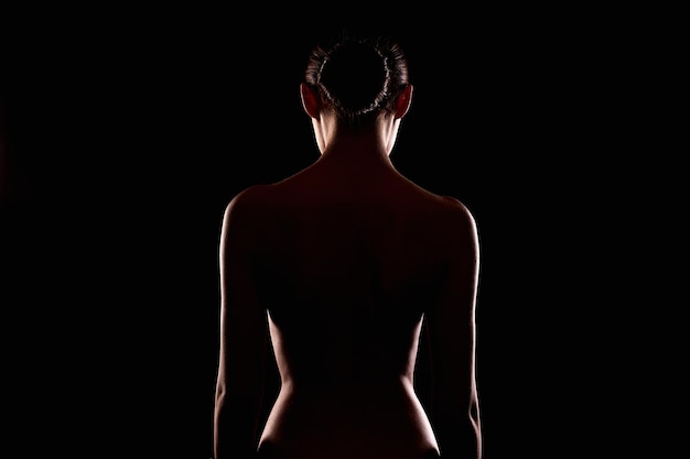 Desnudo femenino silueta de la columna vertebral mujer desnuda