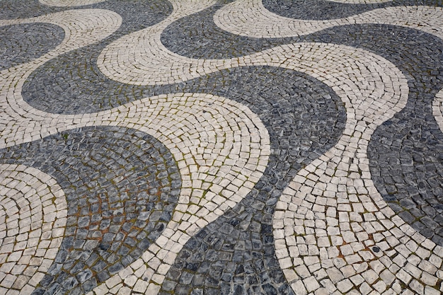 Detalhe de um pavimento da pedra - Lisboa, Portugal.