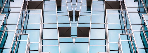 Detalhes da arquitetura edifício moderno fachada de vidro plano de fundo empresarial