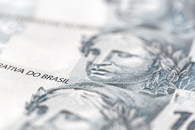 Detalhes da cédula real, dinheiro do Brasil, foco pontual, conceito da economia brasileira ou papel-moeda