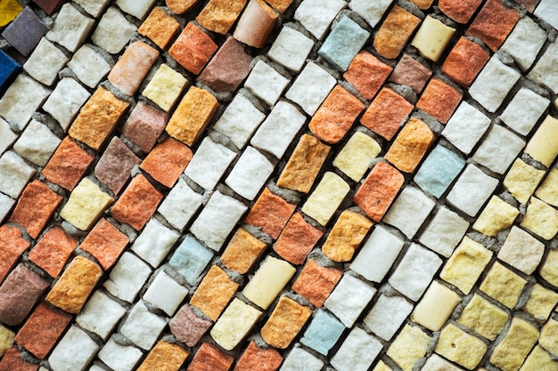 Foto detalhes de uma bela e velha decoração de mosaico cerâmico abstrato em ruínas mosaico veneziano como fundo decorativo