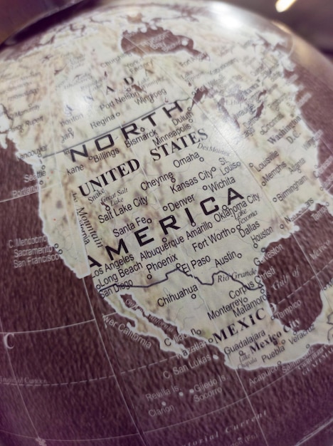 Foto detalle de américa del norte en un globo vintage